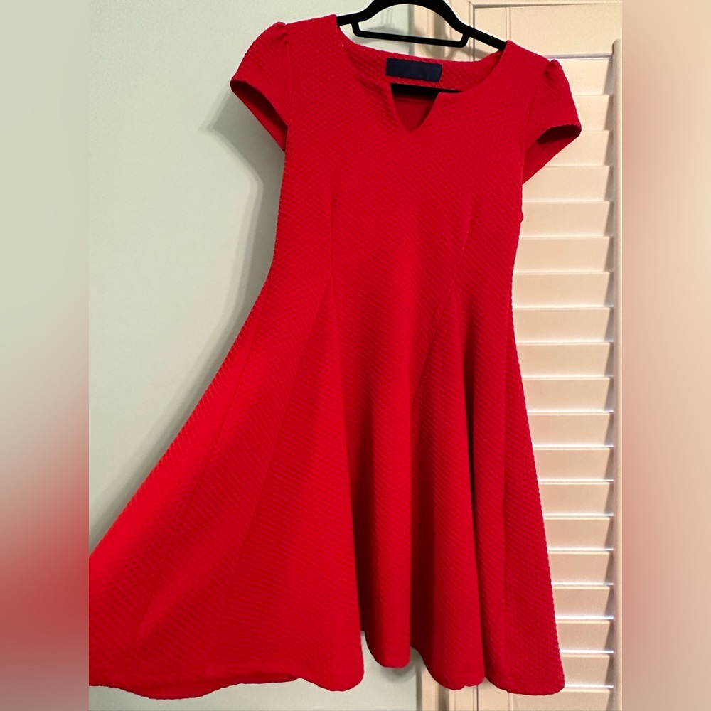 Short bright red flaring dress with stretchy material